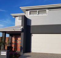 Modern two-story Hampton Style house - Tourism Townsville
